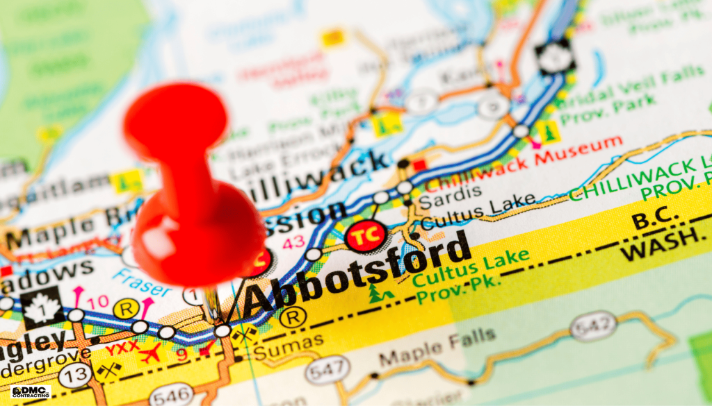 Red pushpin marking Abbotsford on a detailed map, highlighting the location relevant to home renovations by DMC Contracting in the Fraser Valley.